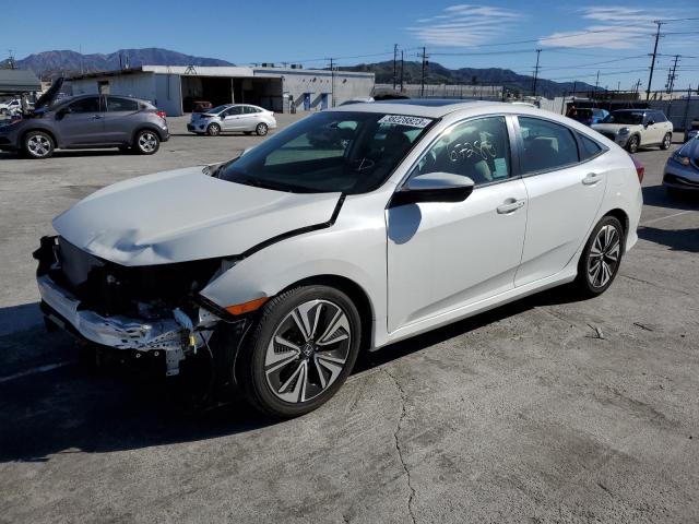 HONDA CIVIC EX 2016 with VIN 2HGFC1F34GH650739 - Photo from auction