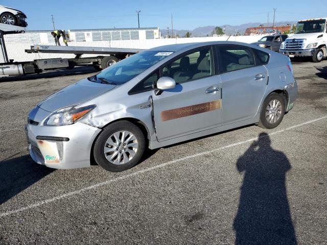 TOYOTA PRIUS PLUG 2014 with VIN JTDKN3DP0E3064628 - Photo from auction