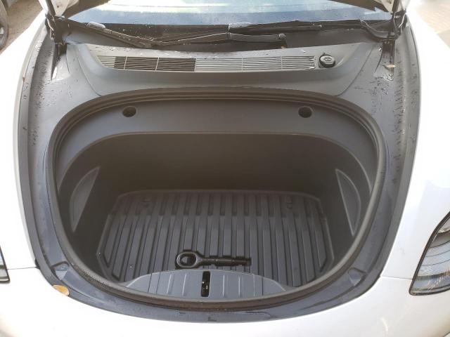 Photo 11 from auction – 2022 TESLA MODEL 3 with VIN 5YJ3E1EB5NF343782