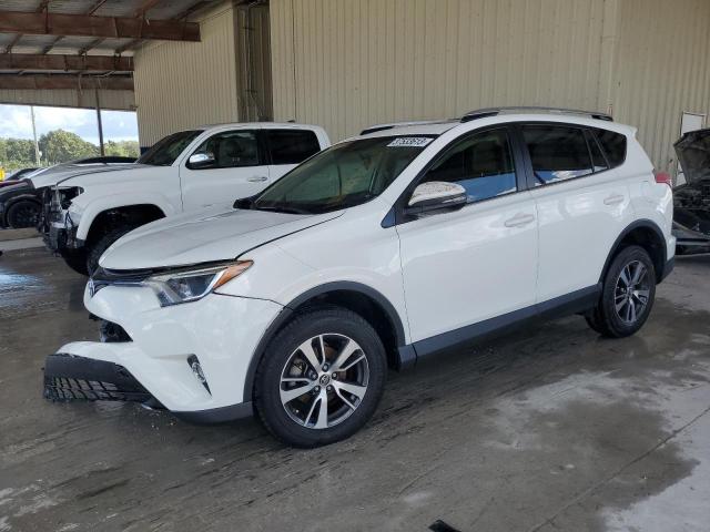 TOYOTA RAV4 XLE 2016 with VIN JTMRFREVXGJ056899 - Photo from auction