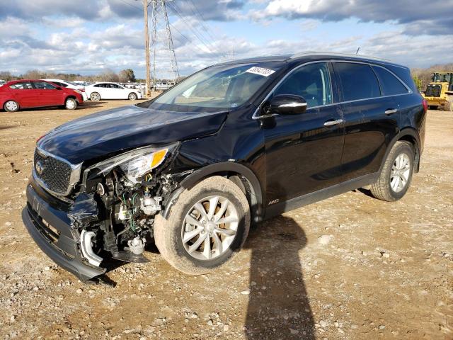 KIA SORENTO LX 2016 with VIN 5XYPGDA32GG168057 - Photo from auction