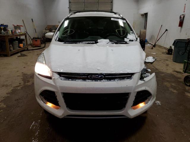 Photo 5 from auction – 2016 FORD ESCAPE TIT with VIN 1FMCU9JX2GUA28642