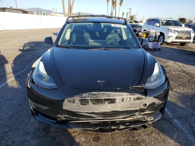 Photo 5 from auction – 2021 TESLA MODEL 3 with VIN 5YJ3E1EB3MF003707