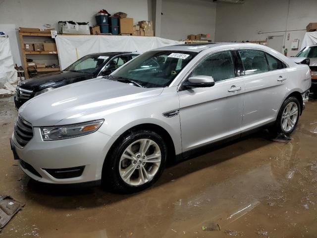 FORD TAURUS SEL 2014 with VIN 1FAHP2E81EG130768 - Photo from auction