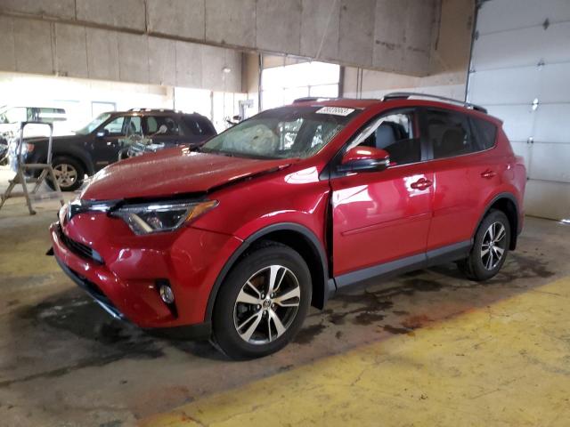 TOYOTA RAV4 XLE 2017 with VIN JTMRFREV5HJ141991 - Photo from auction