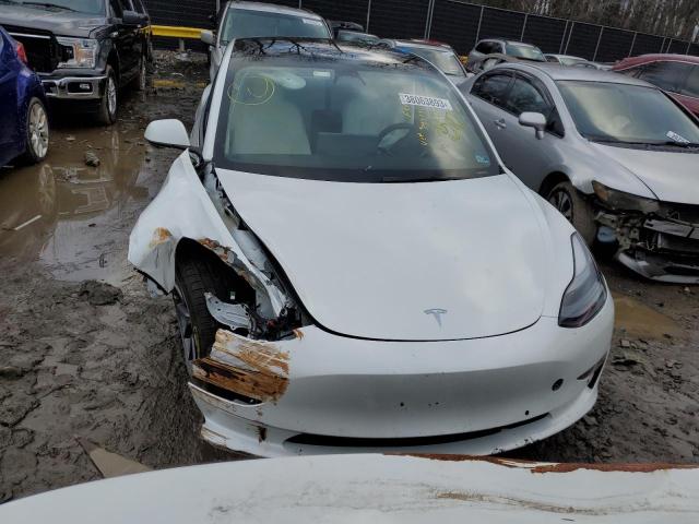 Photo 5 from auction – 2022 TESLA MODEL 3 with VIN 5YJ3E1EAXNF343171