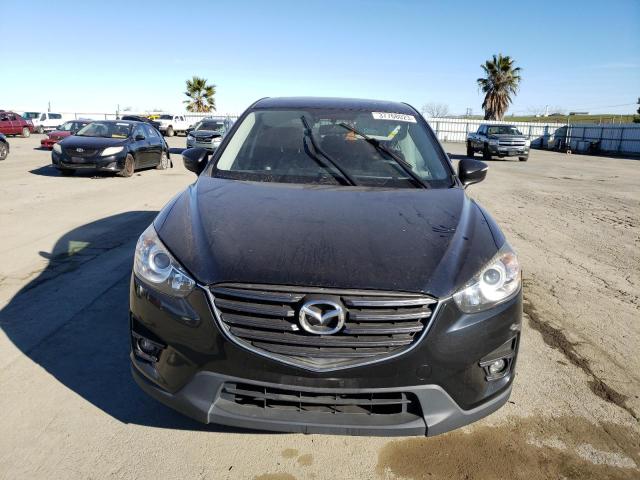 Photo 5 from auction – 2016 MAZDA CX-5 GT with VIN JM3KE2DY6G0721009