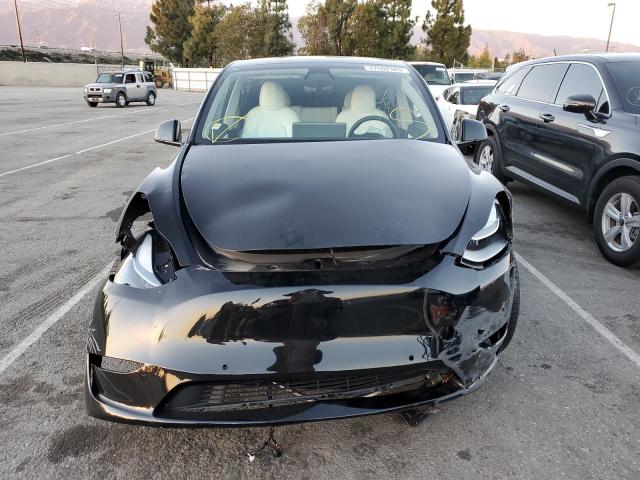 Photo 5 from auction – 2022 TESLA MODEL Y with VIN 7SAYGDEF9NF490002