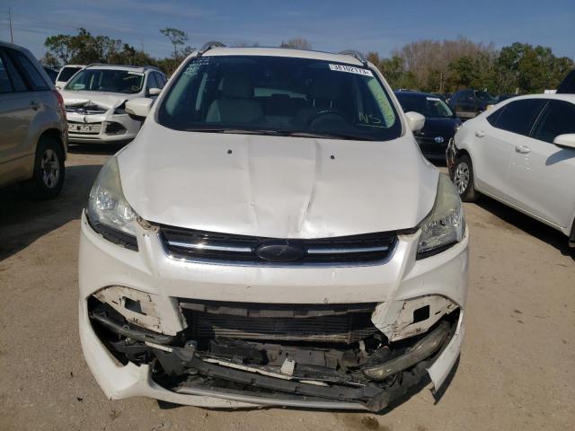 Photo 5 from auction – 2014 FORD ESCAPE TIT with VIN 1FMCU9J94EUC72453