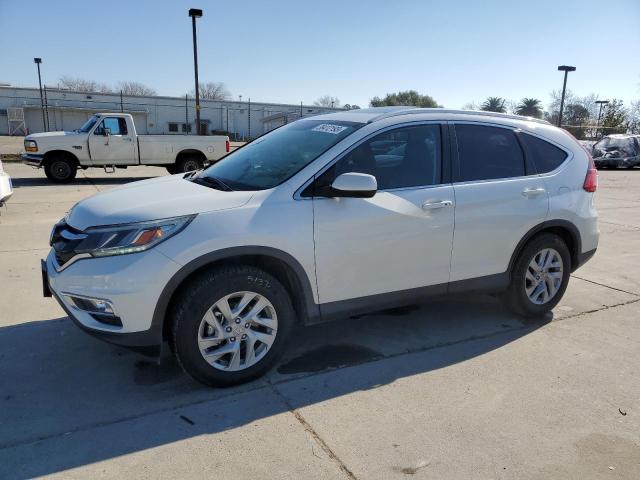 Photo 1 from auction – 2016 HONDA CR-V EXL with VIN 5J6RM4H76GL040056