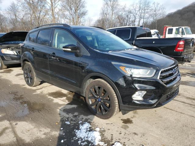 Photo 4 from auction – 2017 FORD ESCAPE TIT with VIN 1FMCU9JD4HUC75510