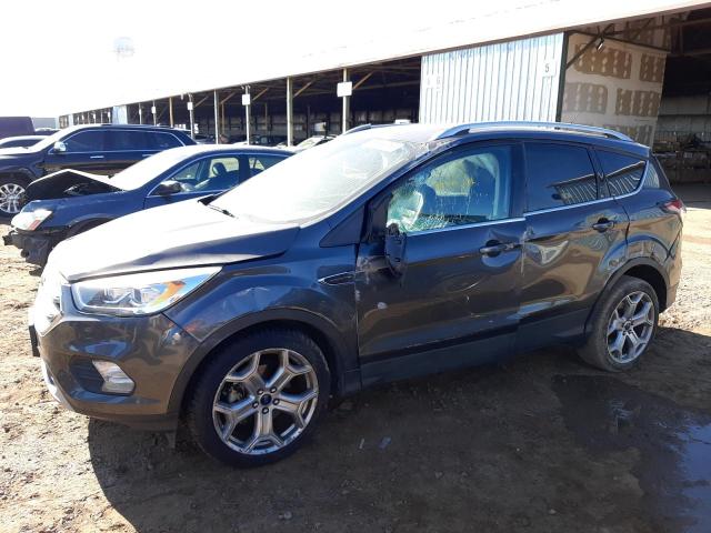 FORD ESCAPE TIT 2017 with VIN 1FMCU0J97HUC26454 - Photo from auction