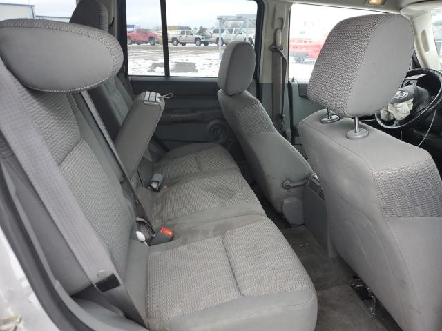 Photo 11 from auction – 2006 JEEP COMMANDER with VIN 1J8HG48N96C125066