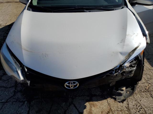 Photo 11 from auction – 2014 TOYOTA COROLLA EC with VIN 5YFBPRHE5EP029886