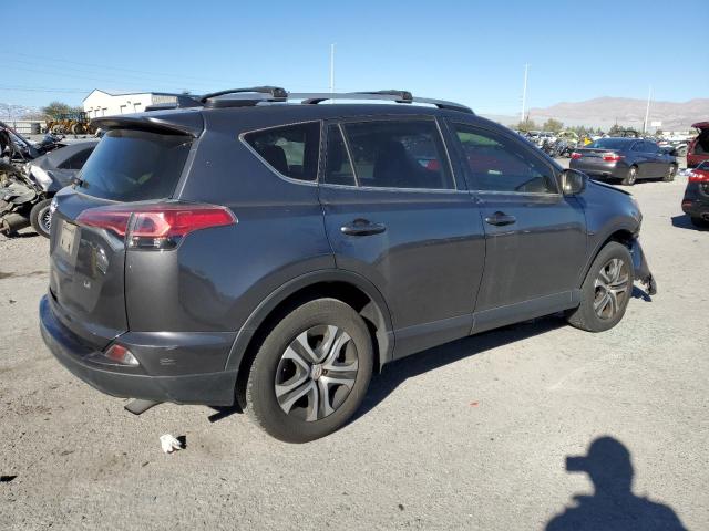Photo 3 from auction – 2017 TOYOTA RAV4 LE with VIN JTMZFREV5HJ114354