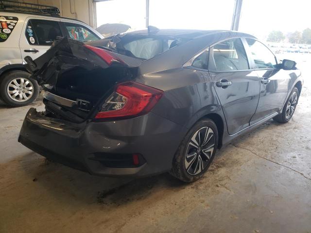 Photo 3 from auction – 2018 HONDA CIVIC EX with VIN JHMFC1F31JX042869