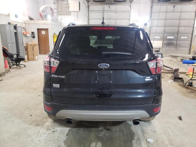 Photo 6 from auction – 2018 FORD ESCAPE SE with VIN 1FMCU9GD7JUD31551