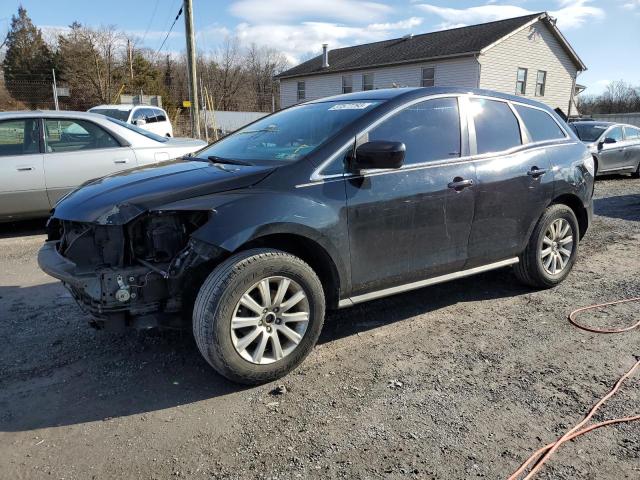 MAZDA CX-7 2011 with VIN JM3ER2AM3B0393947 - Photo from auction