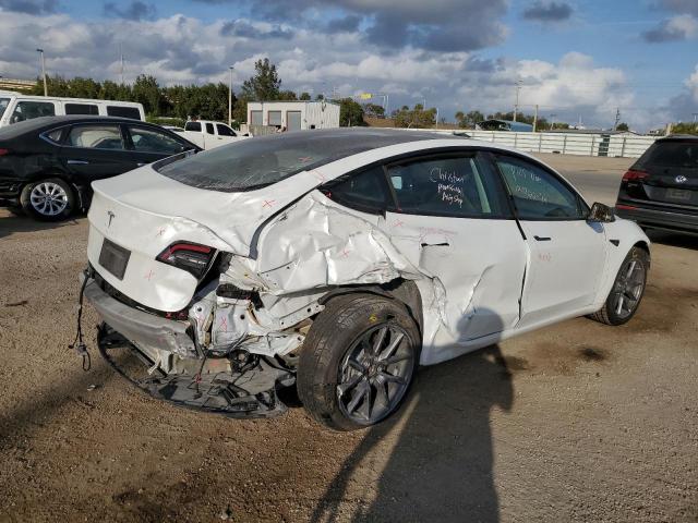 Photo 3 from auction – 2021 TESLA MODEL 3 with VIN 5YJ3E1EA3MF082996