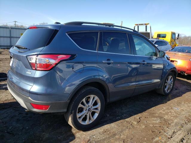 Photo 3 from auction – 2018 FORD ESCAPE SE with VIN 1FMCU0GD3JUC87771