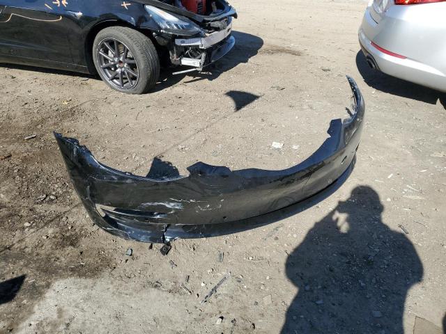 Photo 12 from auction – 2019 TESLA MODEL 3 with VIN 5YJ3E1EA8KF409776