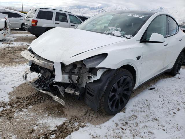 TESLA MODEL Y 2021 with VIN 5YJYGDEE0MF097153 - Photo from auction