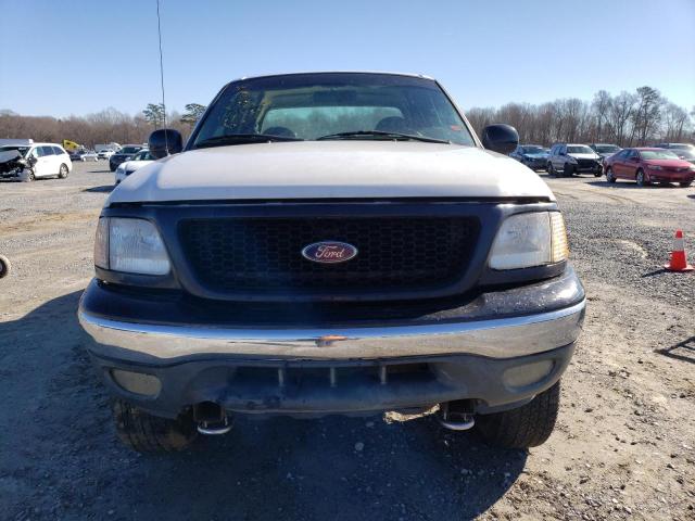Photo 5 from auction – 2000 FORD F150 with VIN 1FTRX18L9YNA74815