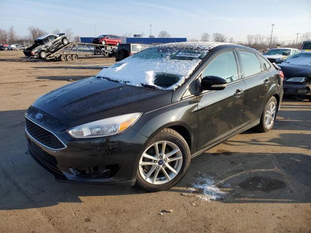 FORD FOCUS SE 2015 with VIN 1FADP3F29FL230270 - Photo from auction