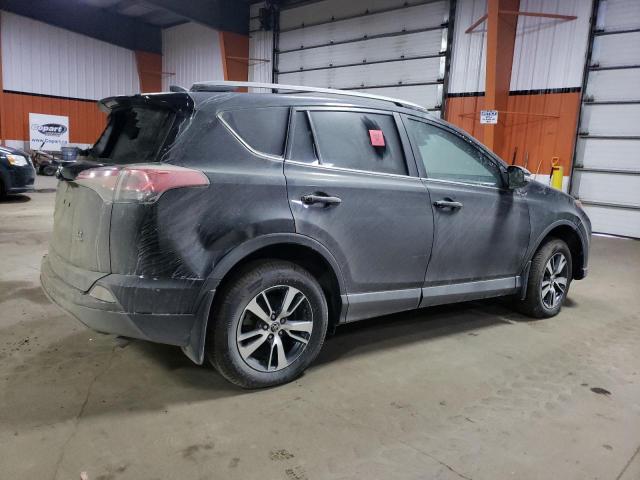 Photo 3 from auction – 2018 TOYOTA RAV4 LE with VIN 2T3BFREV0JW723568