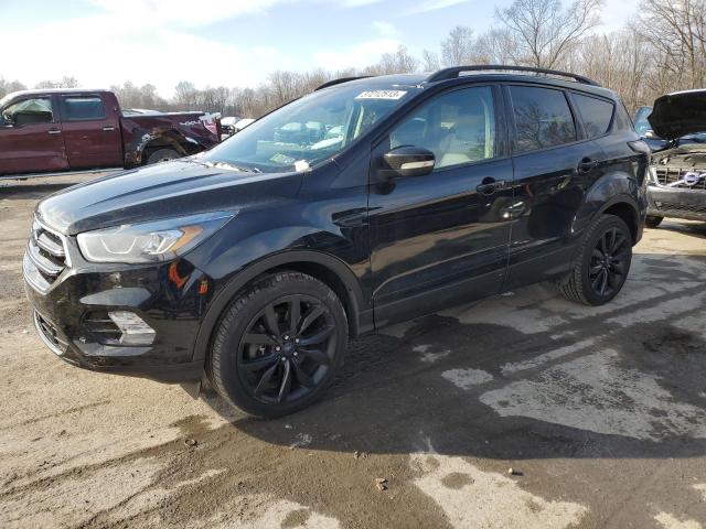FORD ESCAPE TIT 2017 with VIN 1FMCU9JD4HUC75510 - Photo from auction