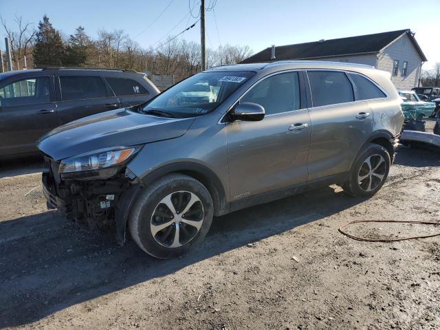 KIA SORENTO EX 2016 with VIN 5XYPHDA56GG119586 - Photo from auction