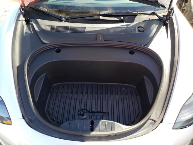 Photo 11 from auction – 2022 TESLA MODEL 3 with VIN 5YJ3E1EB1NF222229