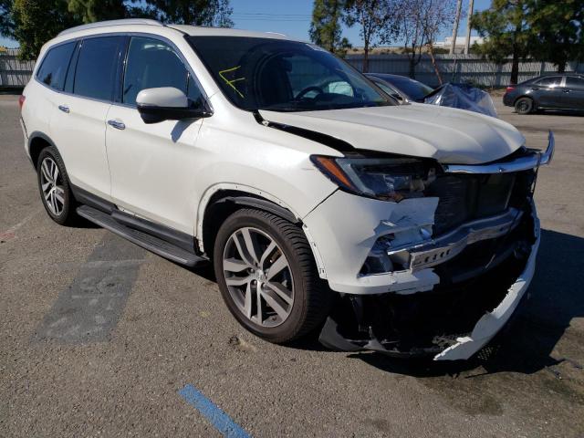 Photo 4 from auction – 2017 HONDA PILOT TOUR with VIN 5FNYF5H92HB017462