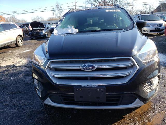 Photo 5 from auction – 2018 FORD ESCAPE SE with VIN 1FMCU9GD8JUC53801