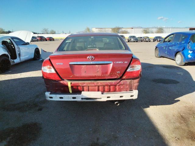 Photo 6 from auction – 2002 TOYOTA CAMRY LE with VIN JTDBF30K320004878