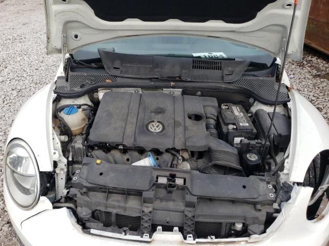 Photo 11 from auction – 2014 VOLKSWAGEN BEETLE with VIN 3VW5P7AT7EM805174