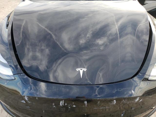 Photo 11 from auction – 2021 TESLA MODEL Y with VIN 5YJYGDEE4MF141140