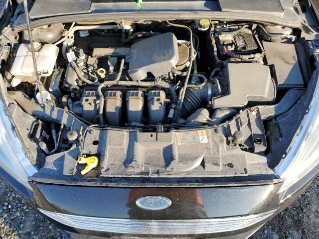 Photo 11 from auction – 2015 FORD FOCUS TITA with VIN 1FADP3N22FL210430