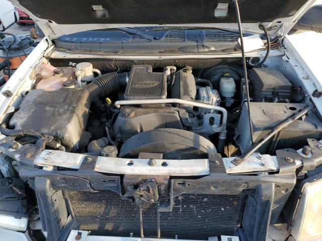 Photo 12 from auction – 2005 GMC ENVOY with VIN 1GKDS13S352339852