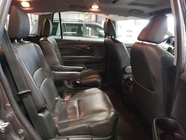 Photo 11 from auction – 2019 HONDA PILOT ELIT with VIN 5FNYF6H06KB028852