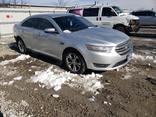 Photo 4 from auction – 2014 FORD TAURUS SEL with VIN 1FAHP2E80EG115842