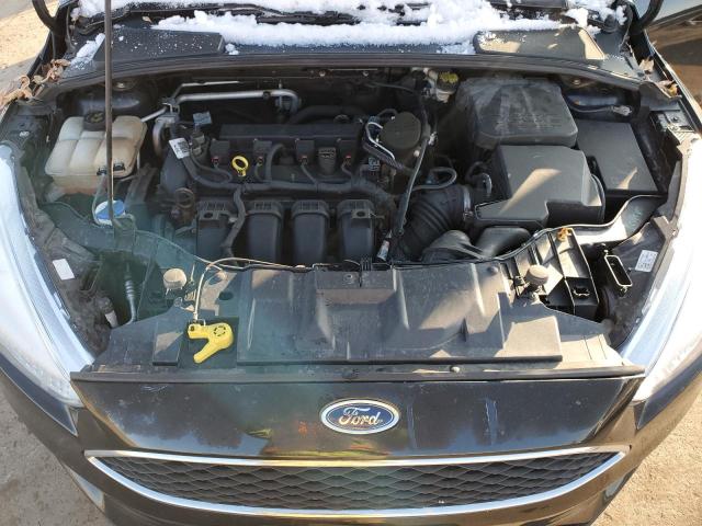 Photo 11 from auction – 2015 FORD FOCUS SE with VIN 1FADP3F29FL230270