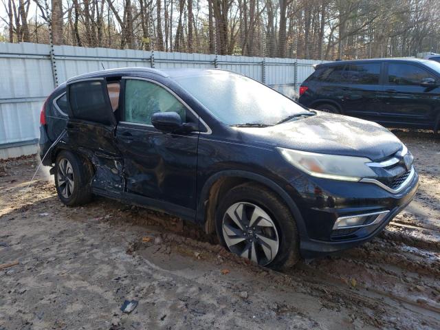 Photo 4 from auction – 2015 HONDA CR-V TOURI with VIN 5J6RM3H95FL021718
