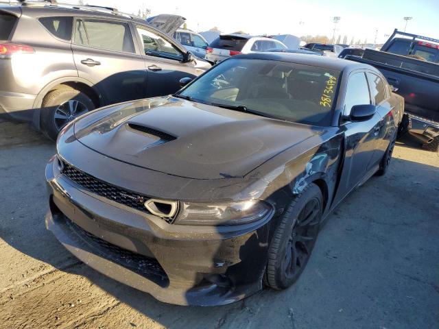 DODGE CHARGER R/ 2018 with VIN 2C3CDXGJ2JH277713 - Photo from auction