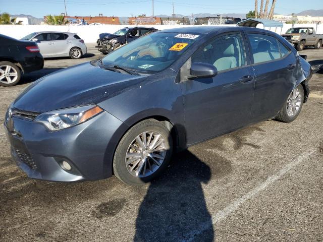 TOYOTA COROLLA L 2014 with VIN 5YFBURHE0EP171619 - Photo from auction