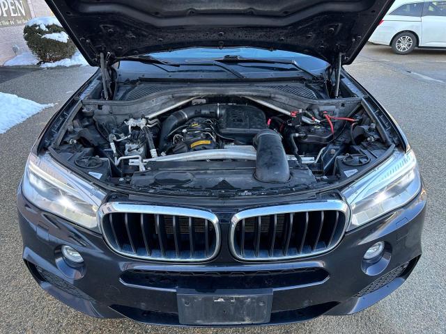 Photo 7 from auction – 2015 BMW X5 XDRIVE3 with VIN 5UXKR0C59F0P01634