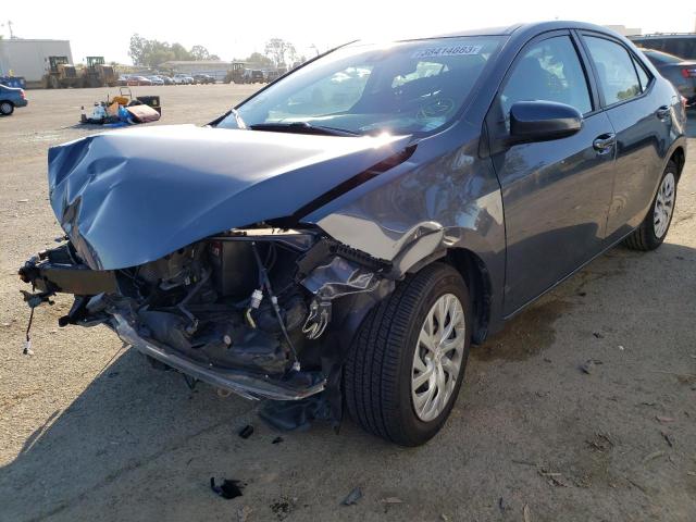 TOYOTA COROLLA L 2018 with VIN 5YFBURHE7JP849955 - Photo from auction
