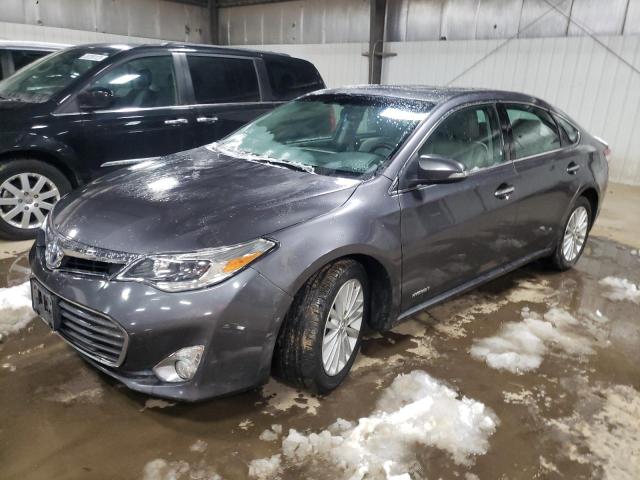 TOYOTA AVALON HYB 2014 with VIN 4T1BD1EB6EU028040 - Photo from auction