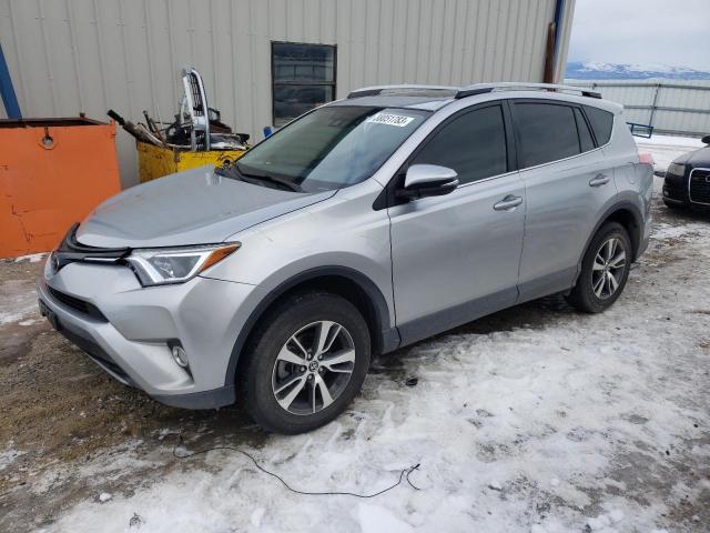 Photo 1 from auction – 2018 TOYOTA RAV4 XLE with VIN JTMRFREV9JJ233689