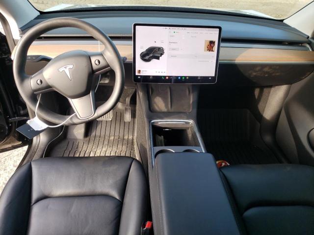 Photo 8 from auction – 2021 TESLA MODEL Y with VIN 5YJYGDEE4MF141140